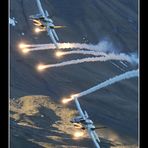 F/A-18 Hornets with flares over Axalp 2010 - Switzerland