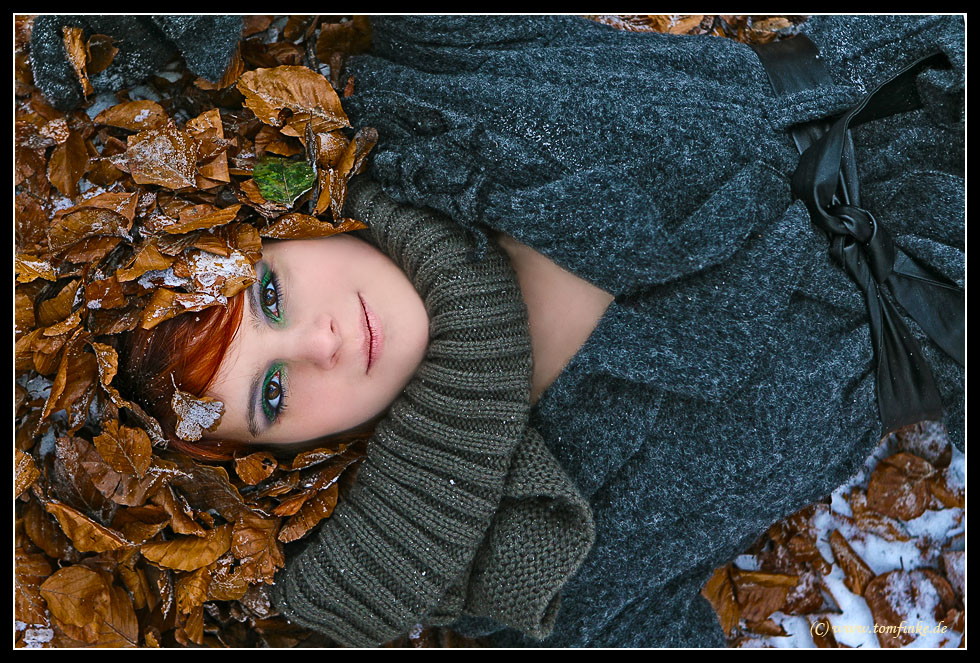 Face in the leaves