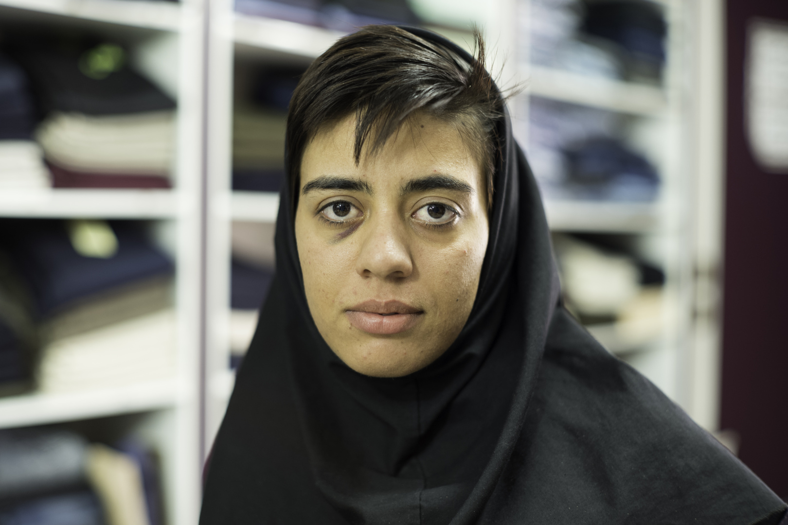 Faces of Iran - Saleswoman in a clothing store