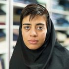 Faces of Iran - Saleswoman in a clothing store