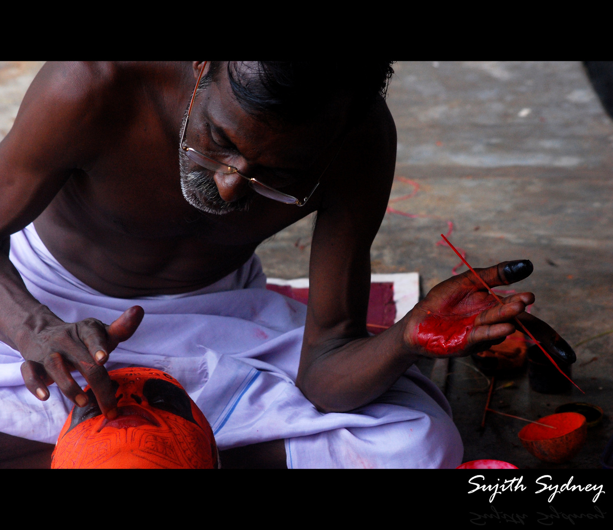 Facial decoration on Theyyam