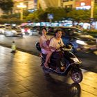 Familie auf Moped