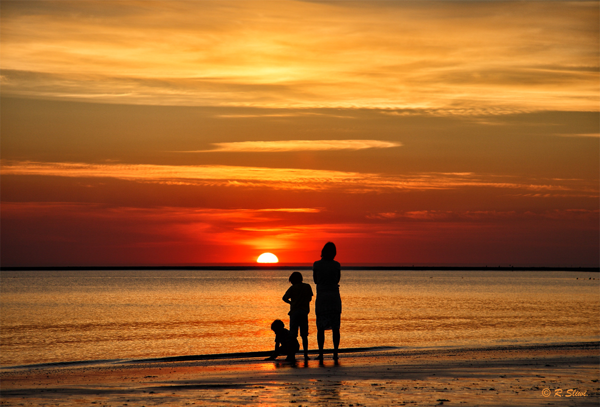 Familie und Sonnenuntergang