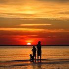 Familie und Sonnenuntergang