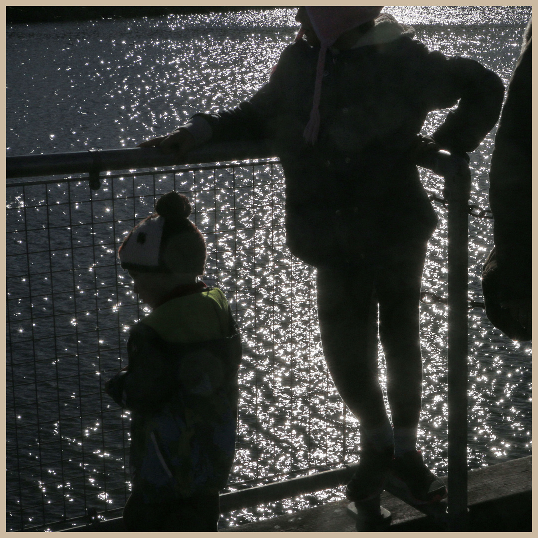 family at seahouses harbour