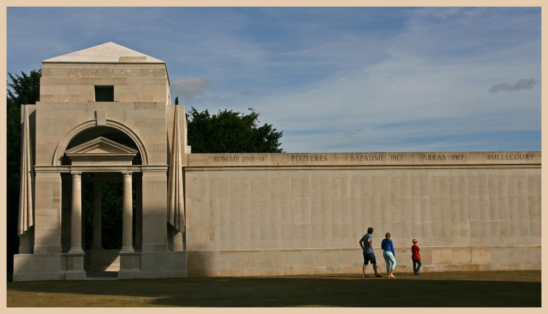 family reading names at villers bretonneux