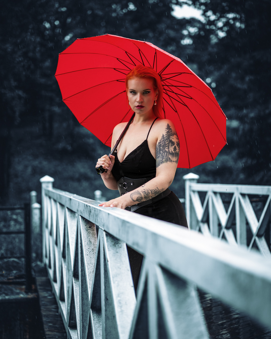 Fashion photoshoot in rain. Finnish summer