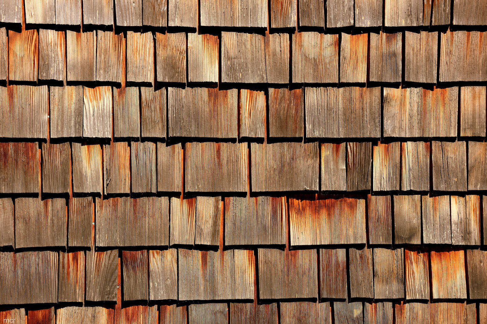 Fassadenverkleidung mit Holzschindeln