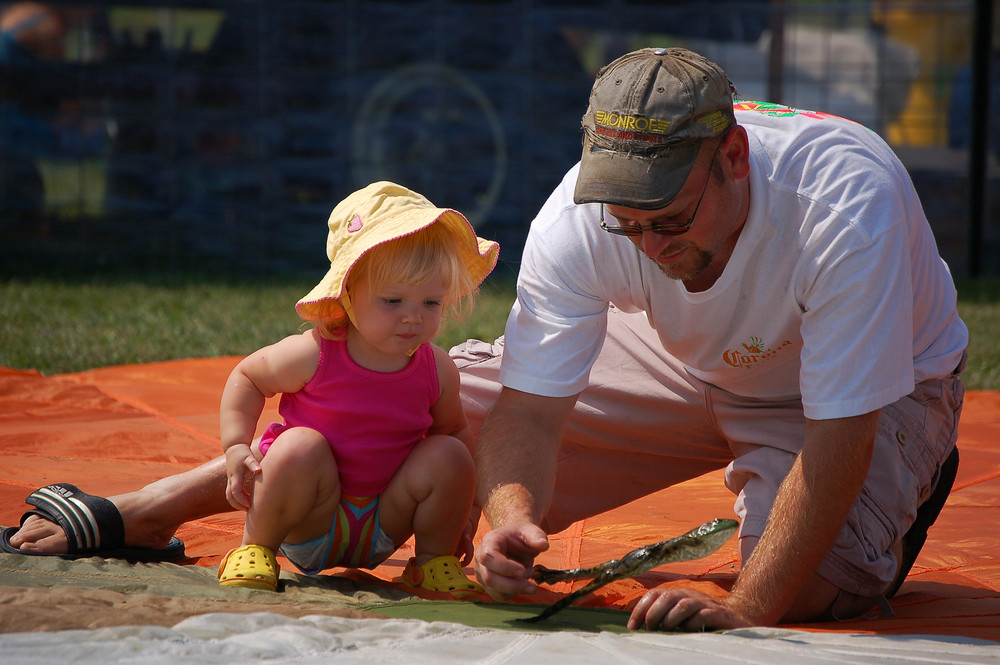 Father and Daughter Frog Jumping Festival