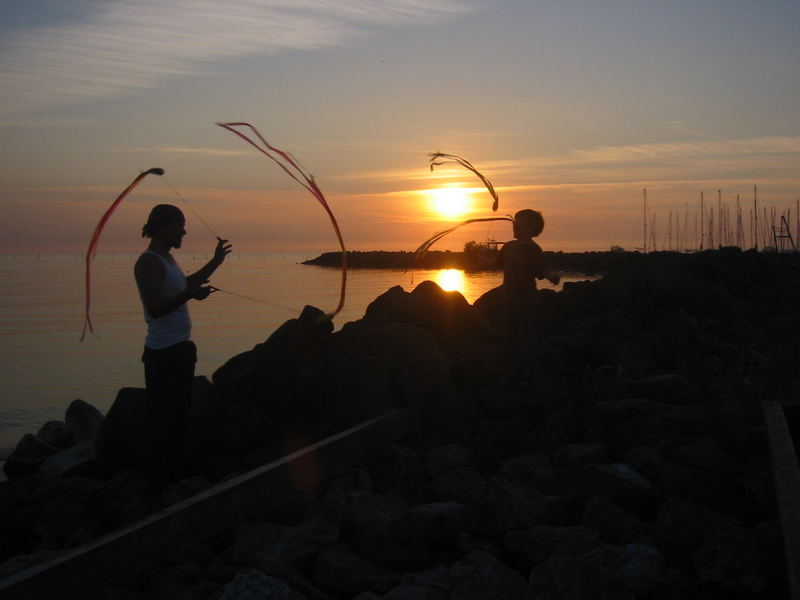 Father and Son and Poi on the Beach