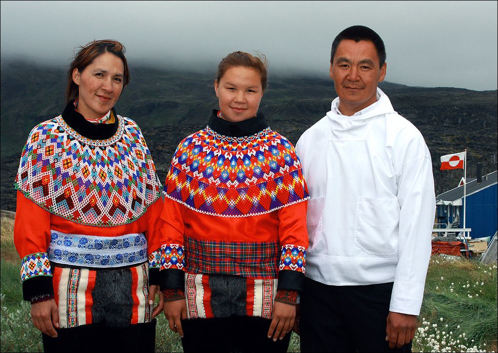 Father, mother and daughter in National costumes for the celebration of confirmation. Greenland. von Kent Schou Larsen 