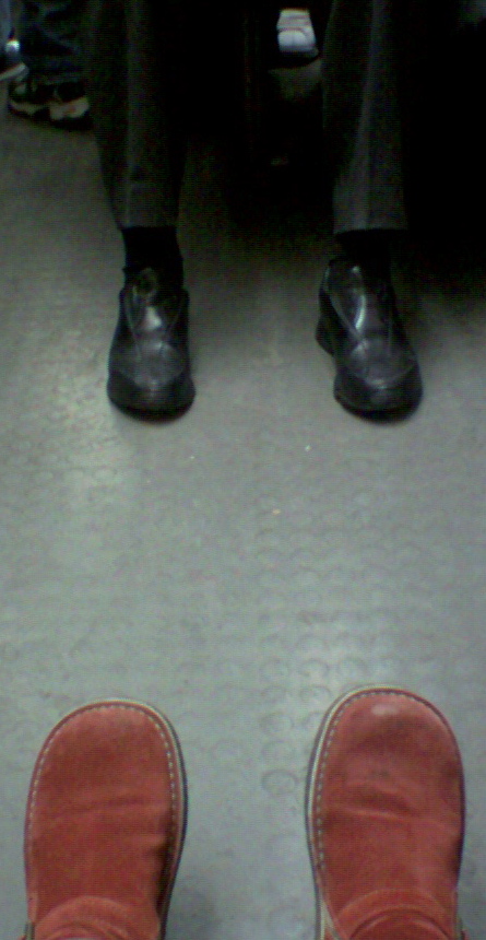 Feet in the subway