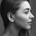 female profile with silver jewelry