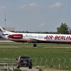 Fernsehturm, Porsche Cayenne und Air Berlin in einem Bild