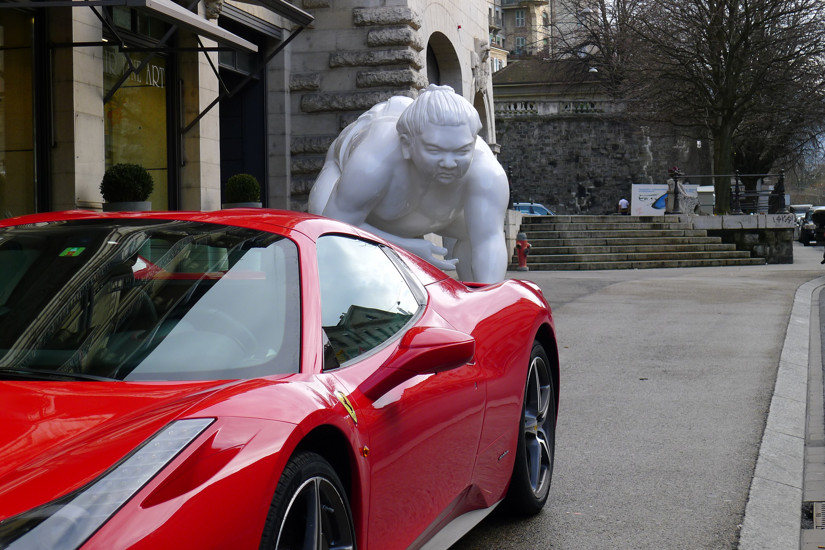 ferrari and sumo sculpture