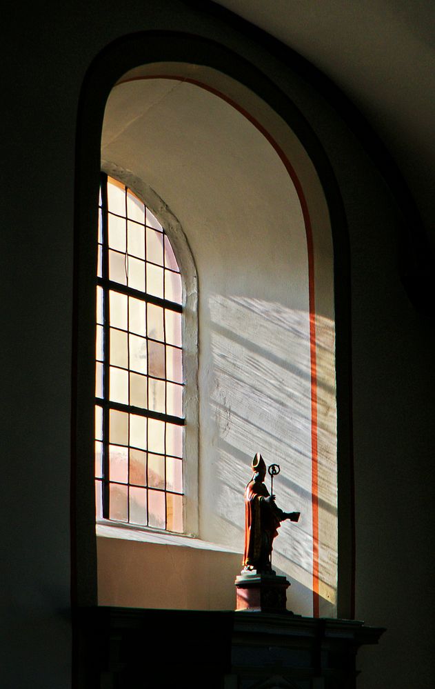 Figur am Fenster