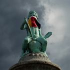 Figur auf einem Brunnen in Essen/Margarethenhöhe/Marktplatz