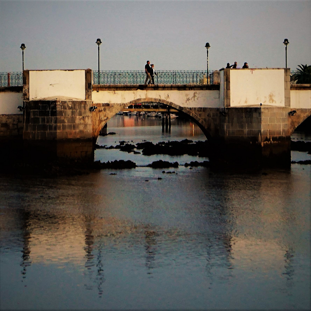 Figures on the bridge