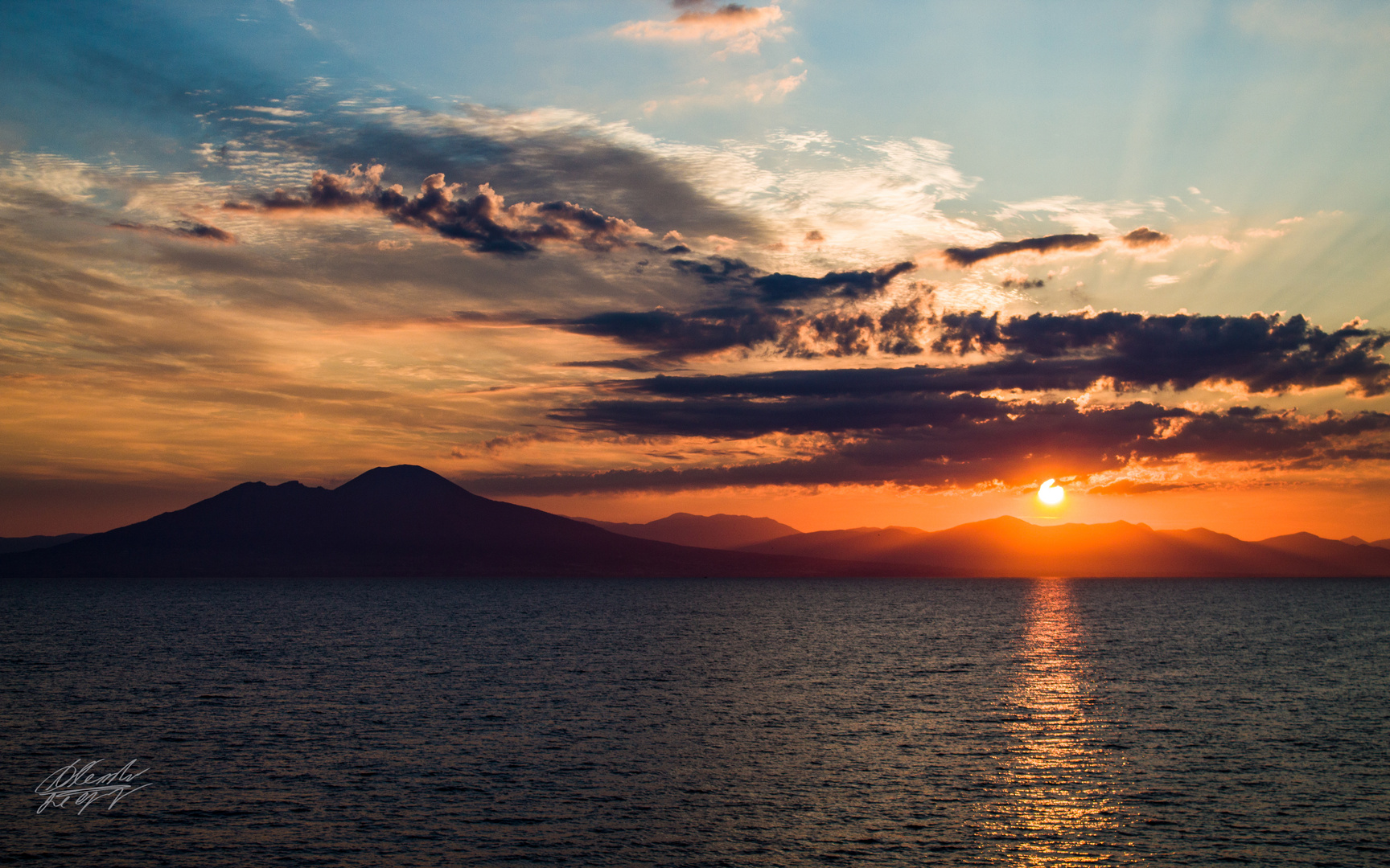 First lights behind Vesuvius in Napoli - Italy