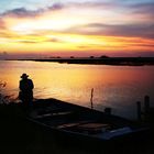 Fischer am Fluss in der Abenddämmerung am Rio Apure