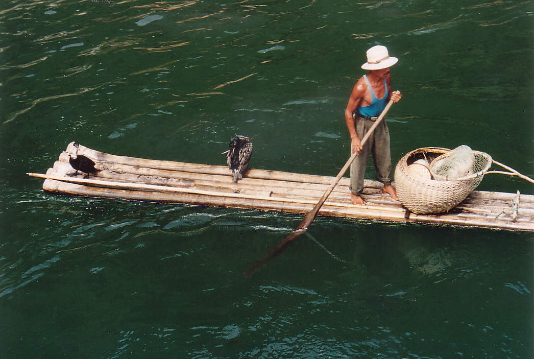 Fischer auf dem Li-Fluss