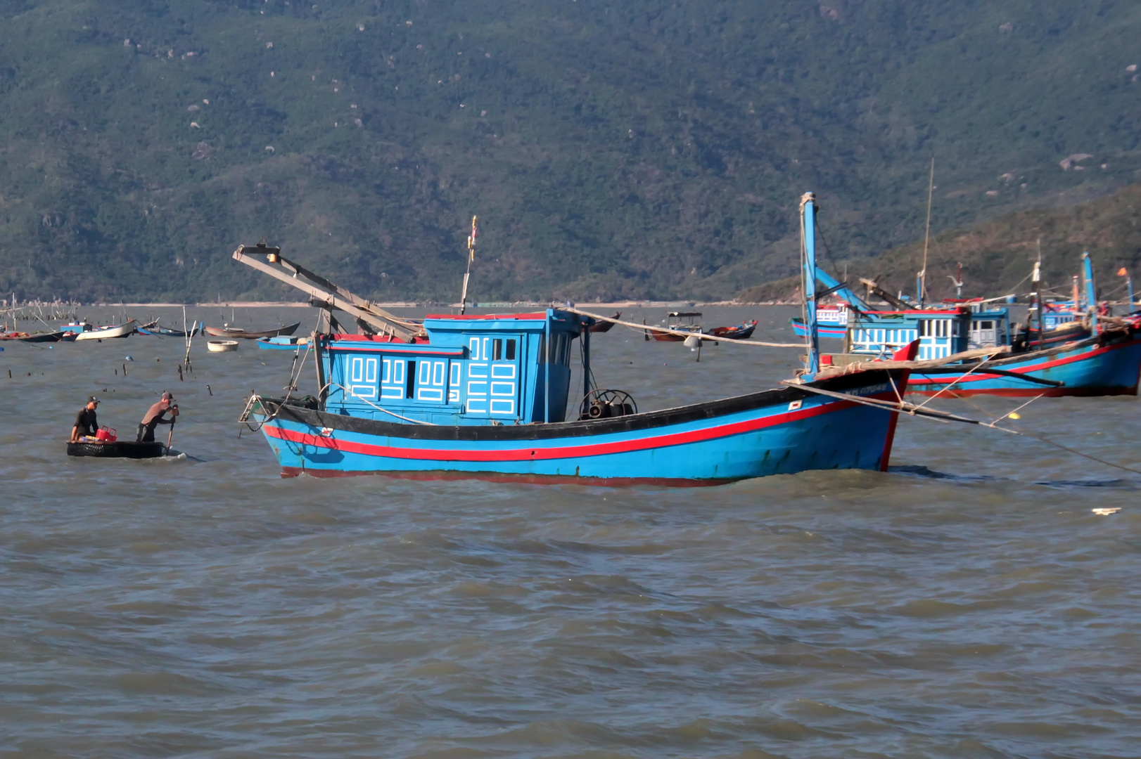 Fischer im Korb Boot