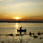 Fischer im Sonnenaufgang an der Wolga