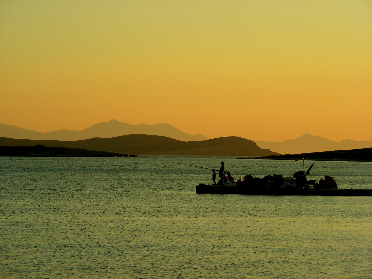 Fischer im Sonnenuntergang