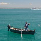 Fischer in Porto Santo Stefano fängt eine Octopuss