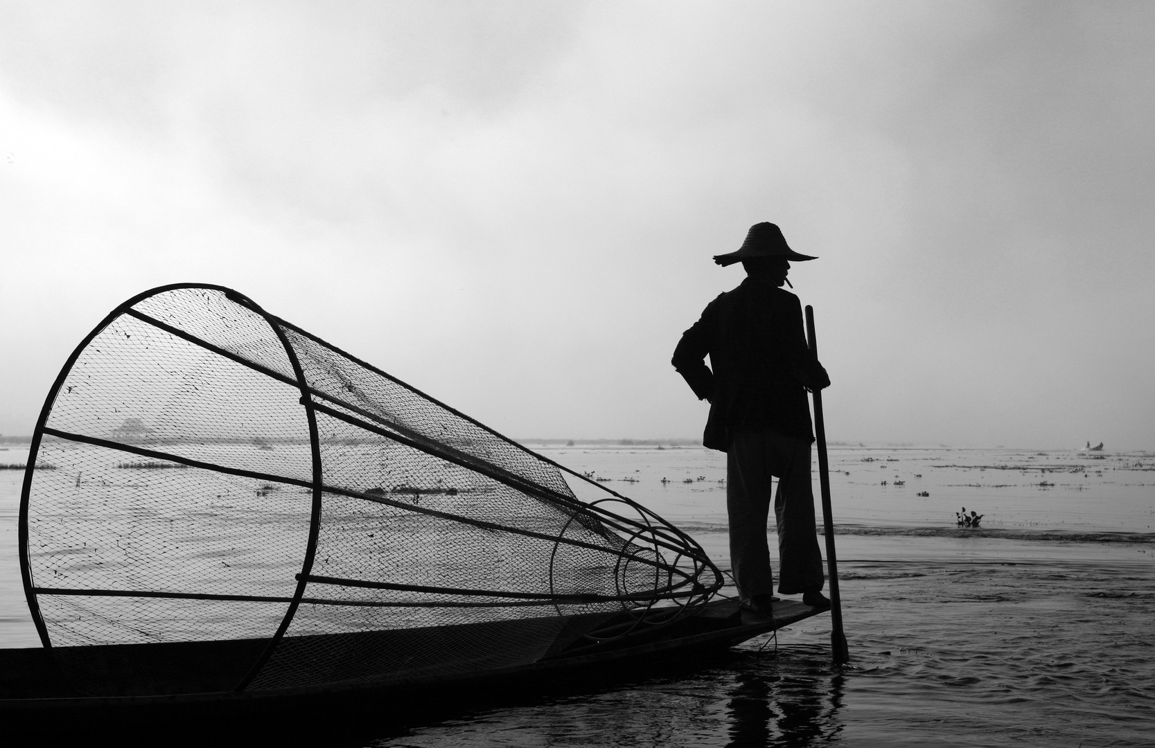 Fischer mit Boot,  im Morgenlicht