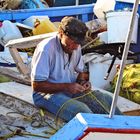 Fischerarbeit im Chaos