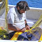 Fischerarbeit im Wasser