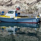 Fischerboot gespiegelt