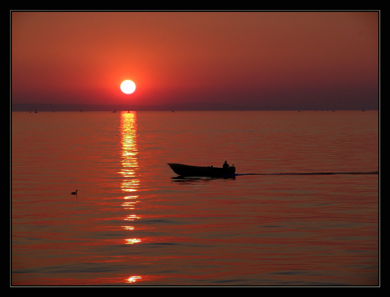 Fischerboot im Abendlicht