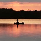 Fischerboot im Abendrot auf dem Wörthsee