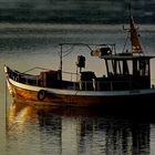Fischerboot im beginnenden Sonnenuntergang...