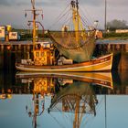 Fischerboot im Morgenlicht