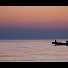 Fischerboot im Sonnenaufgang