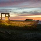 Fischerboot im Sonnenuntergang