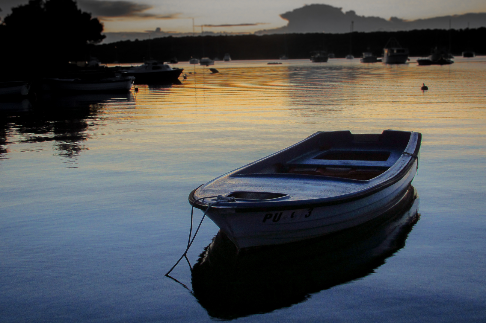 Fischerboot Pu am Strand von Banjole