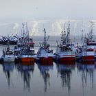 Fischerboote im Schnee