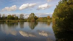 Fischteich mit Wolken