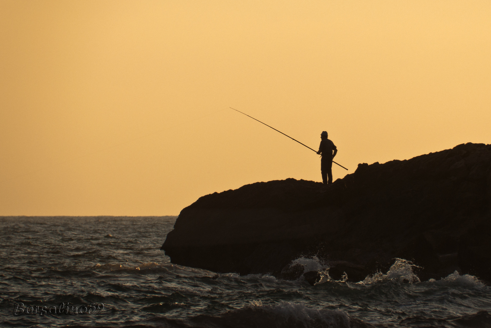 Fisherman at sunset