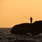 Fisherman at sunset