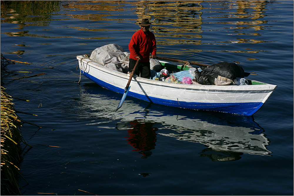 fisherman at titicaca lake