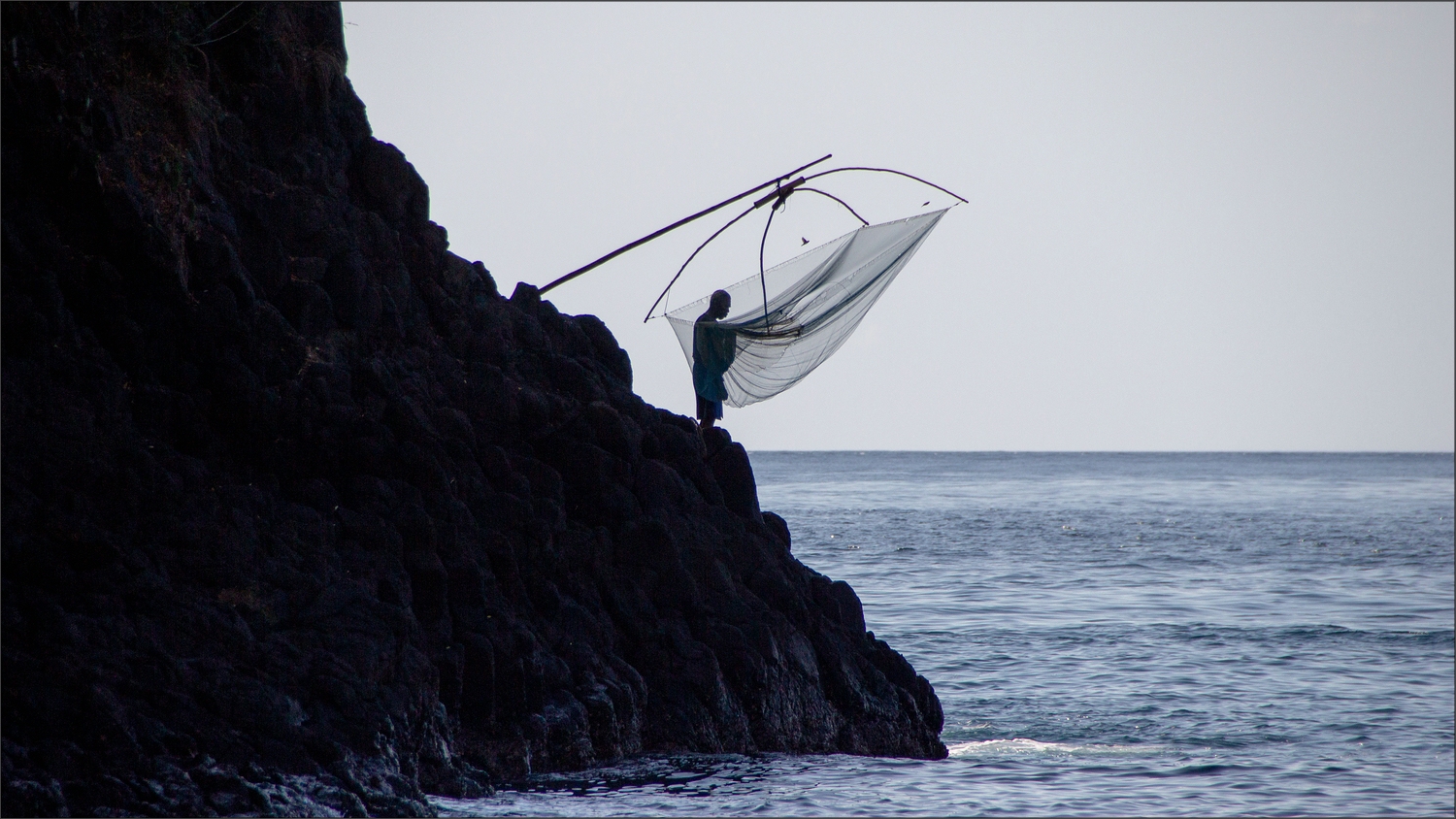   * Fisherman at work *