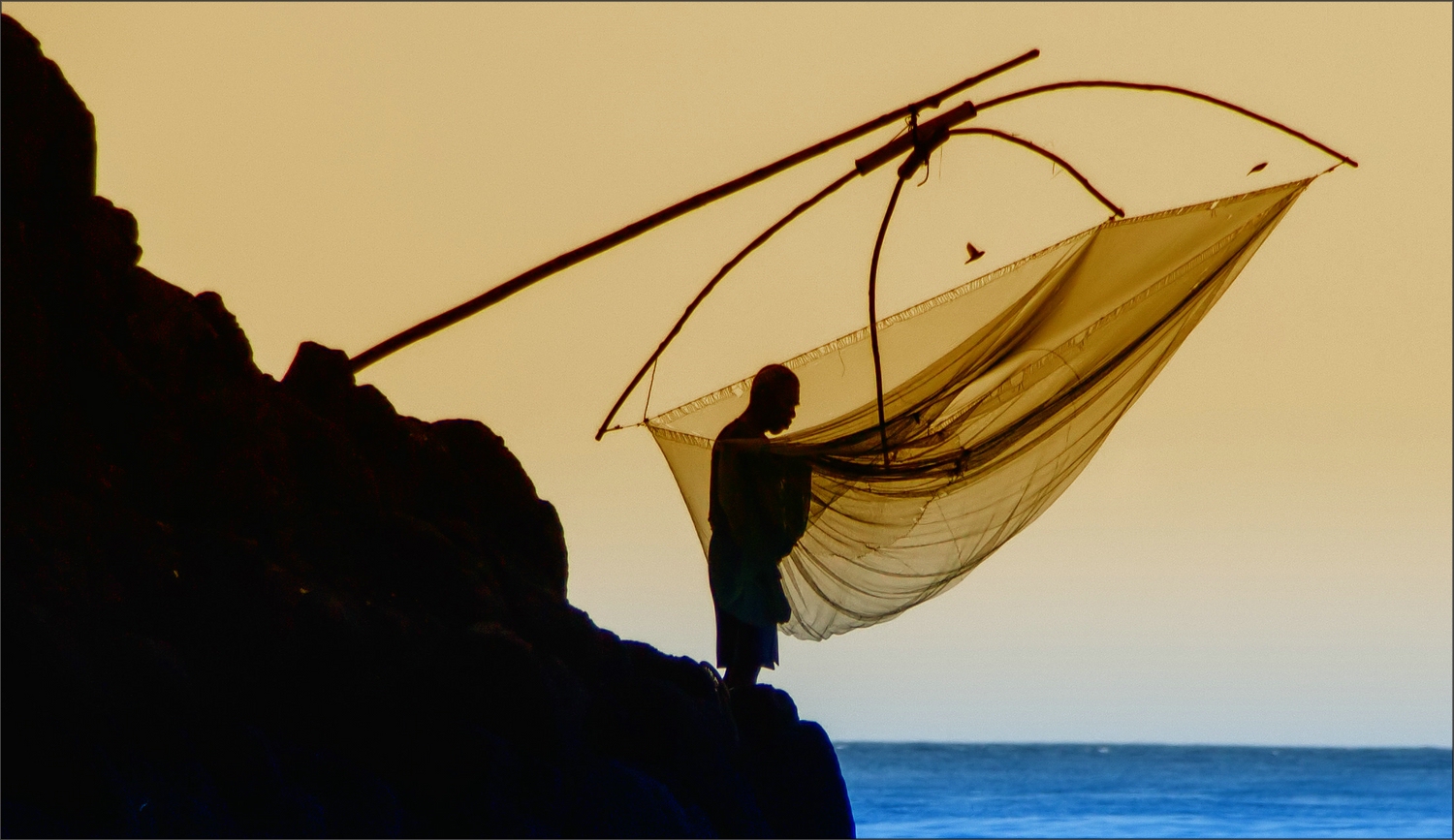   * Fisherman at work ***