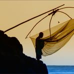   * Fisherman at work ***