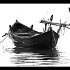 fisherman boat on razelm lake - danube delta, romania