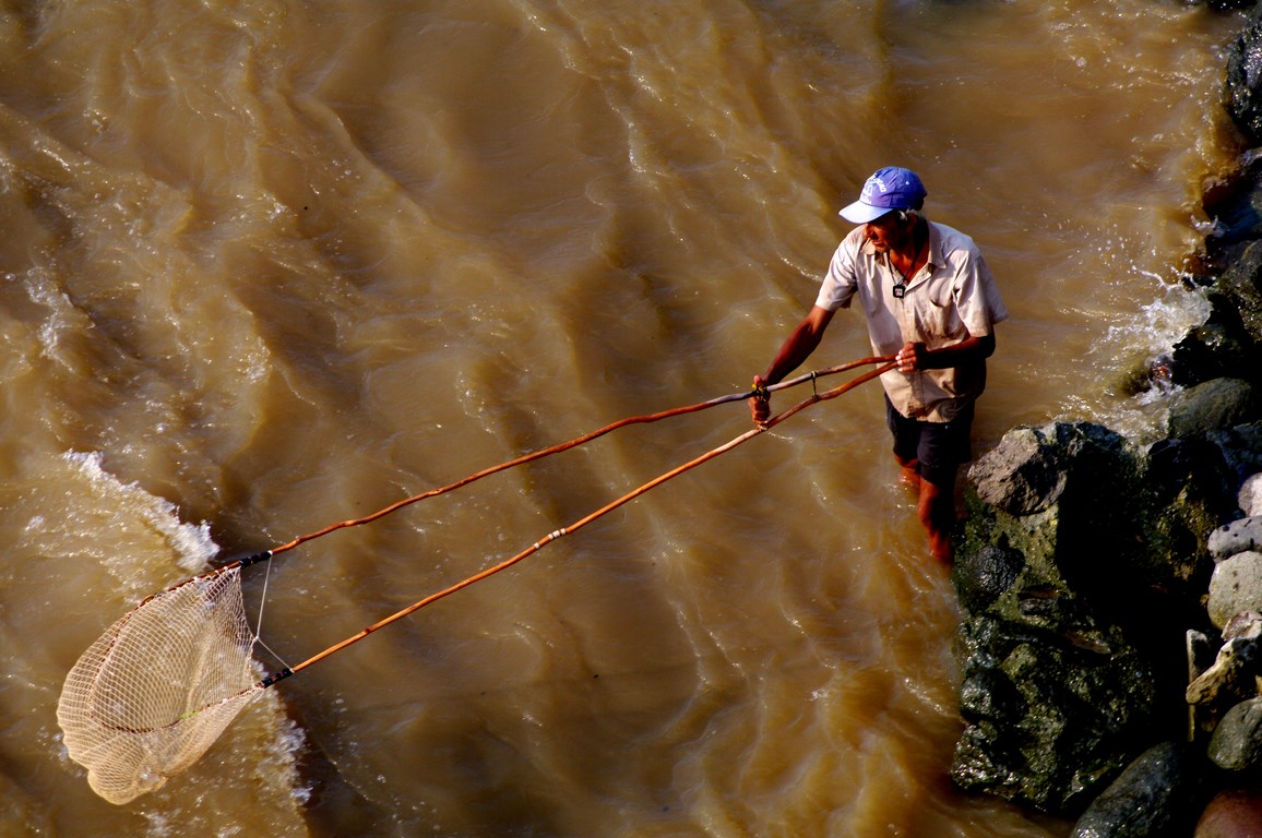 Fisherman on Colombia's Magdalena river